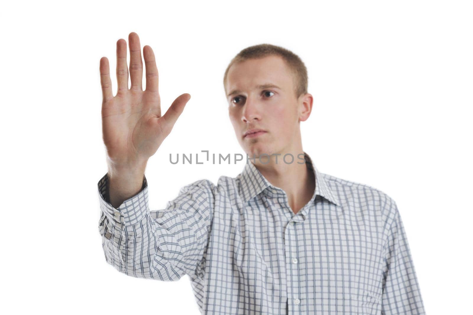 handsome young business man touching screen isolated on white bacground