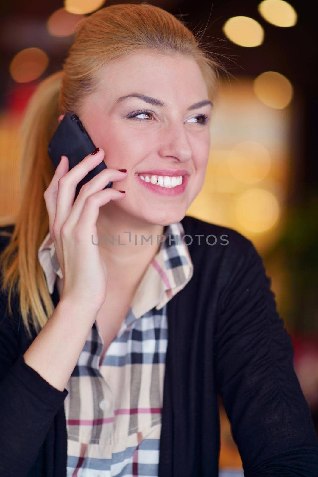 Portrait of a beautiful business woman talk by phone