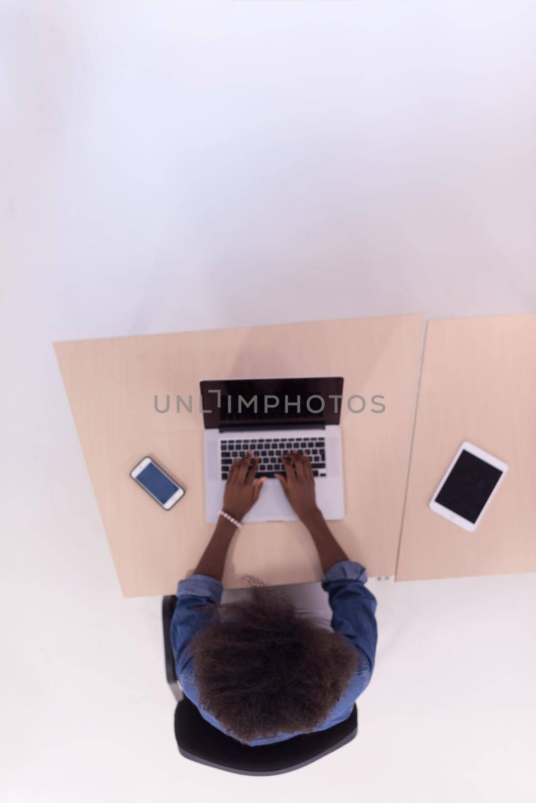 Top View Of young african american informal Businesswoman Working At Computer In Office