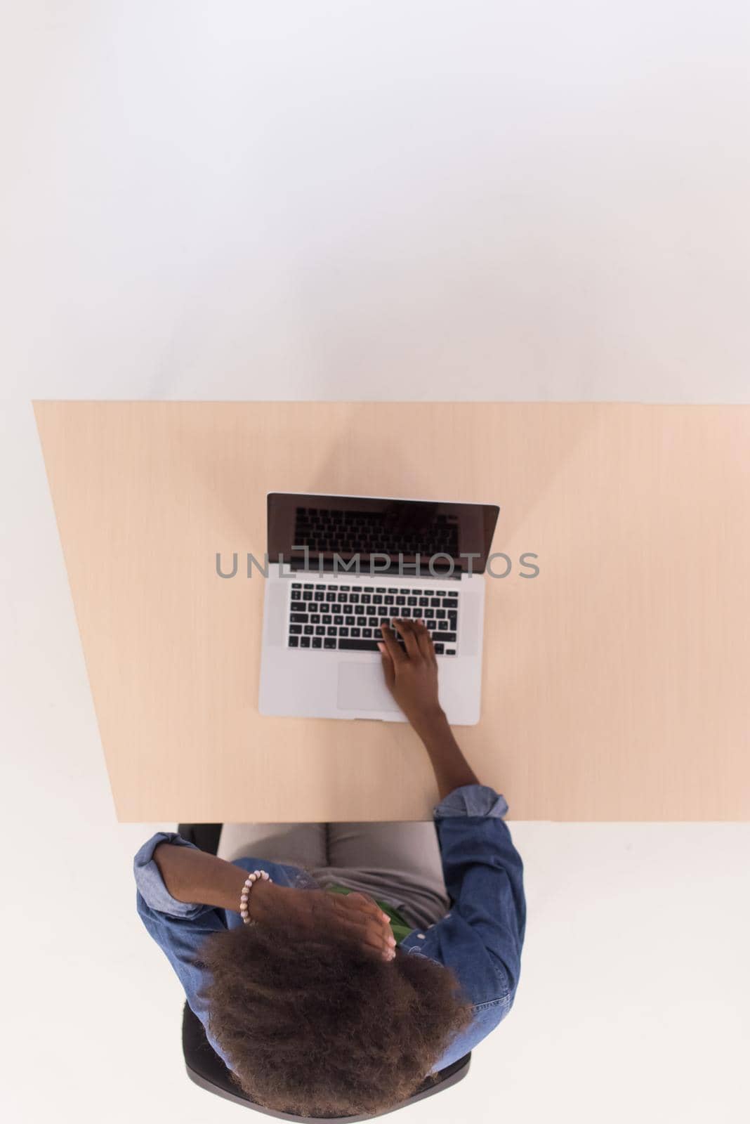 Top View Of young african american informal Businesswoman Working At Computer In Office