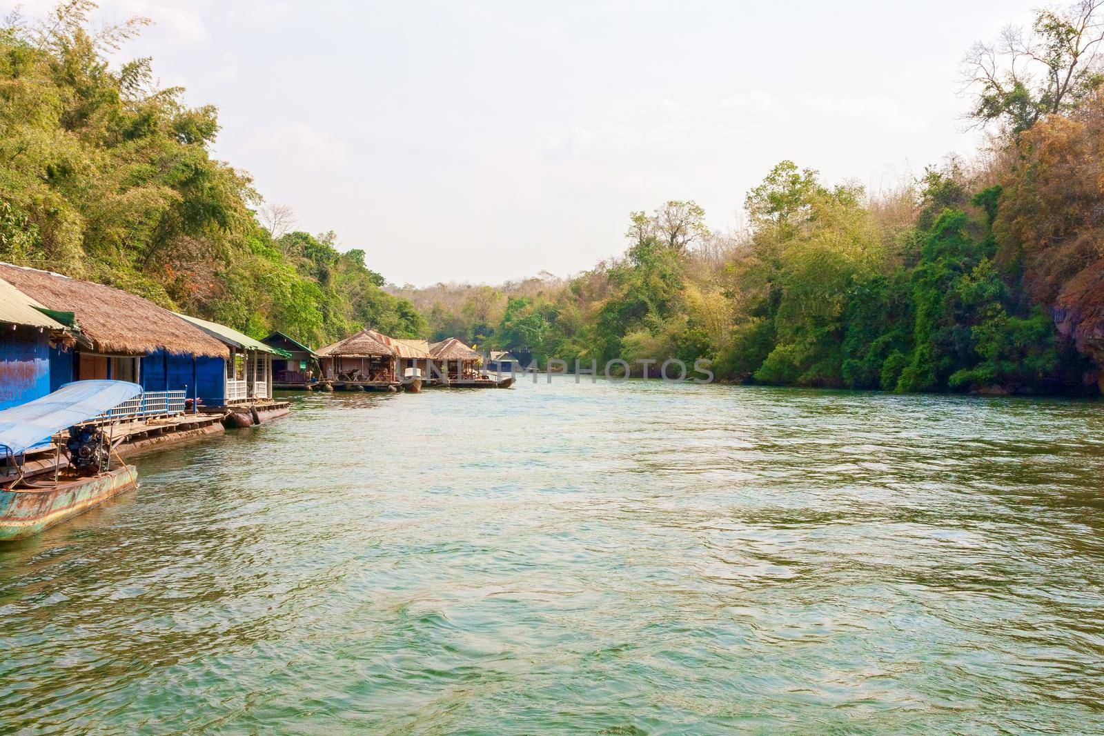 Floating tourist huts on the river Kwai, Thailand. by kolesnikov_studio