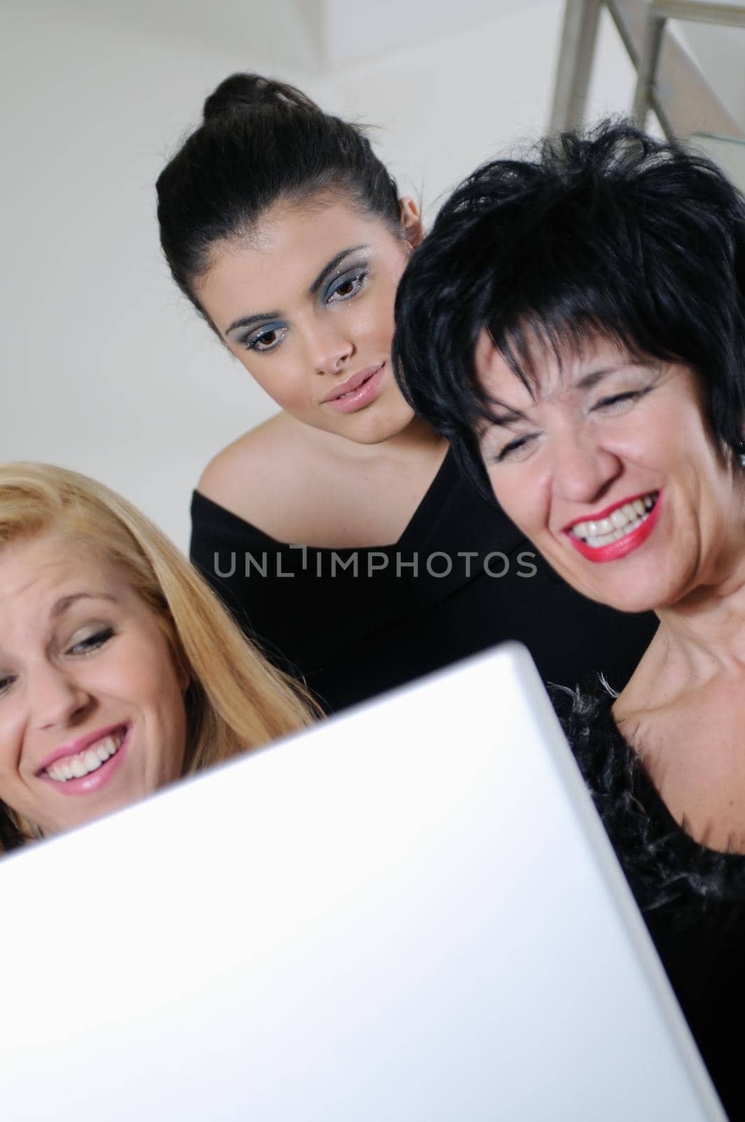 business woman group team work on laptop at staircase