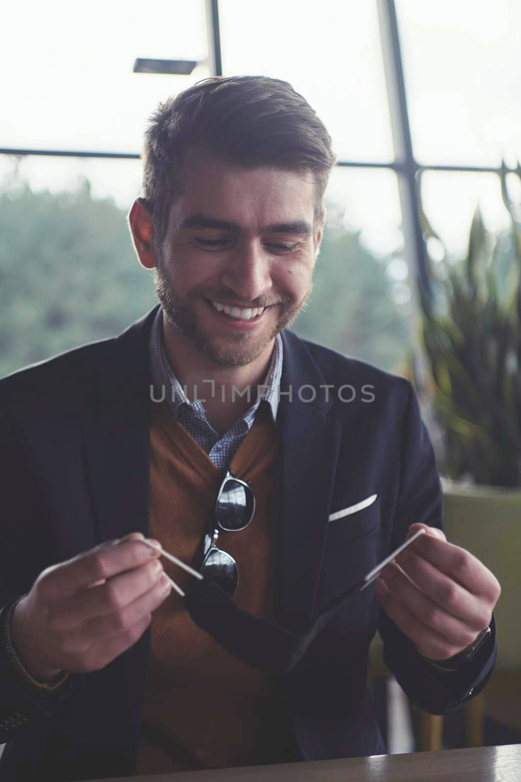 corporate businessman wearing protective medical face mask at modern open space office concept of new normal in business