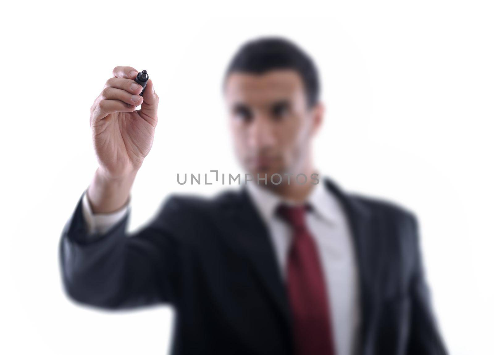 business man draw with marker on empty copy space isolated on white in studio