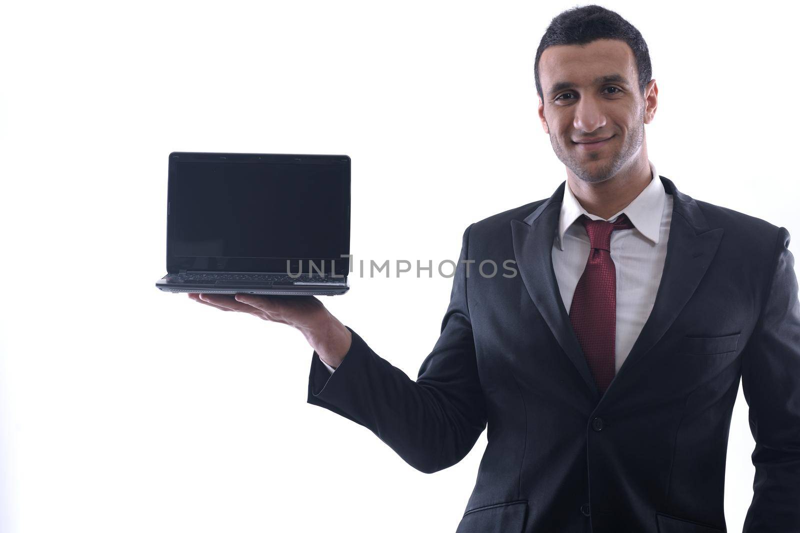 business man work on mini laptop by dotshock