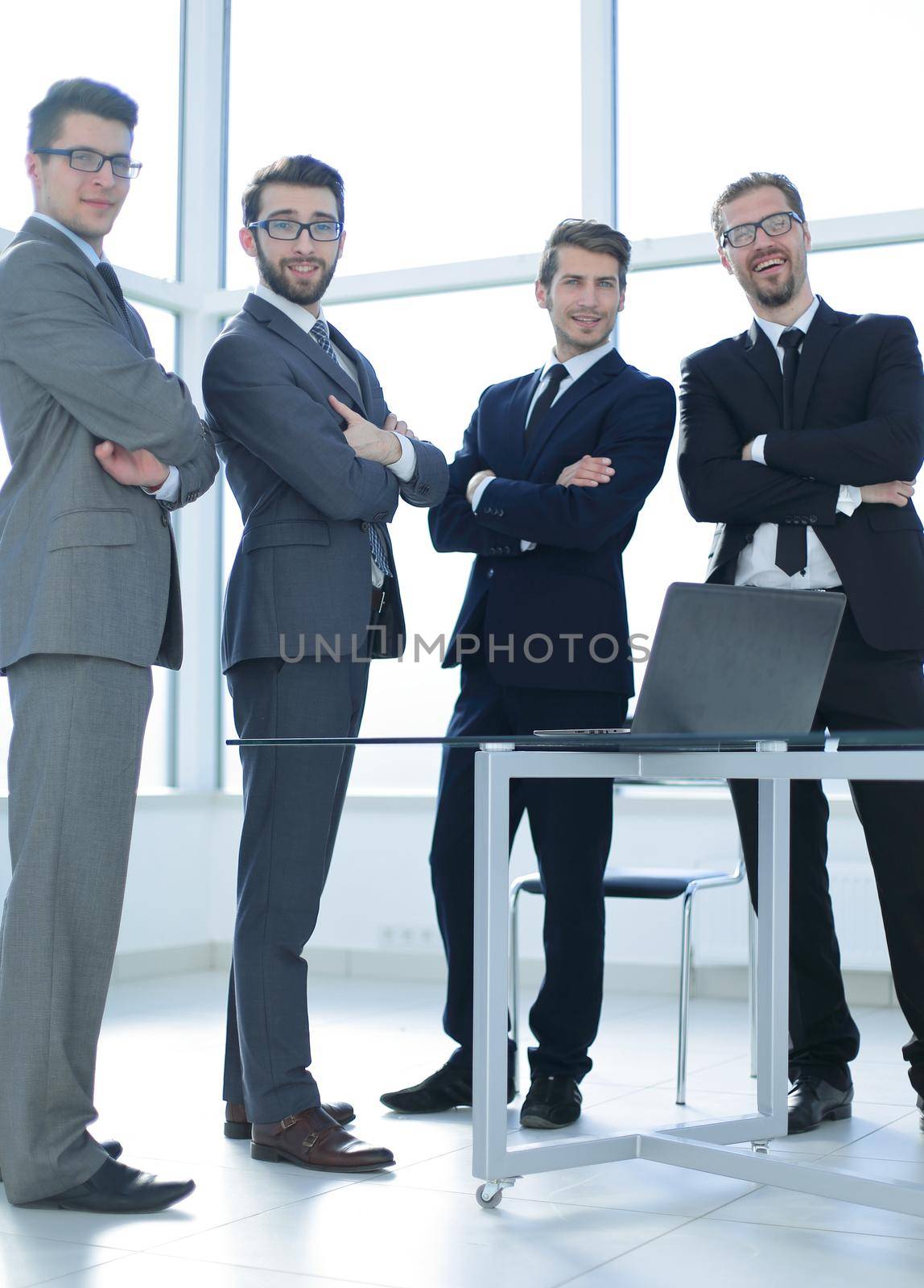 group of business people standing in the office. by asdf