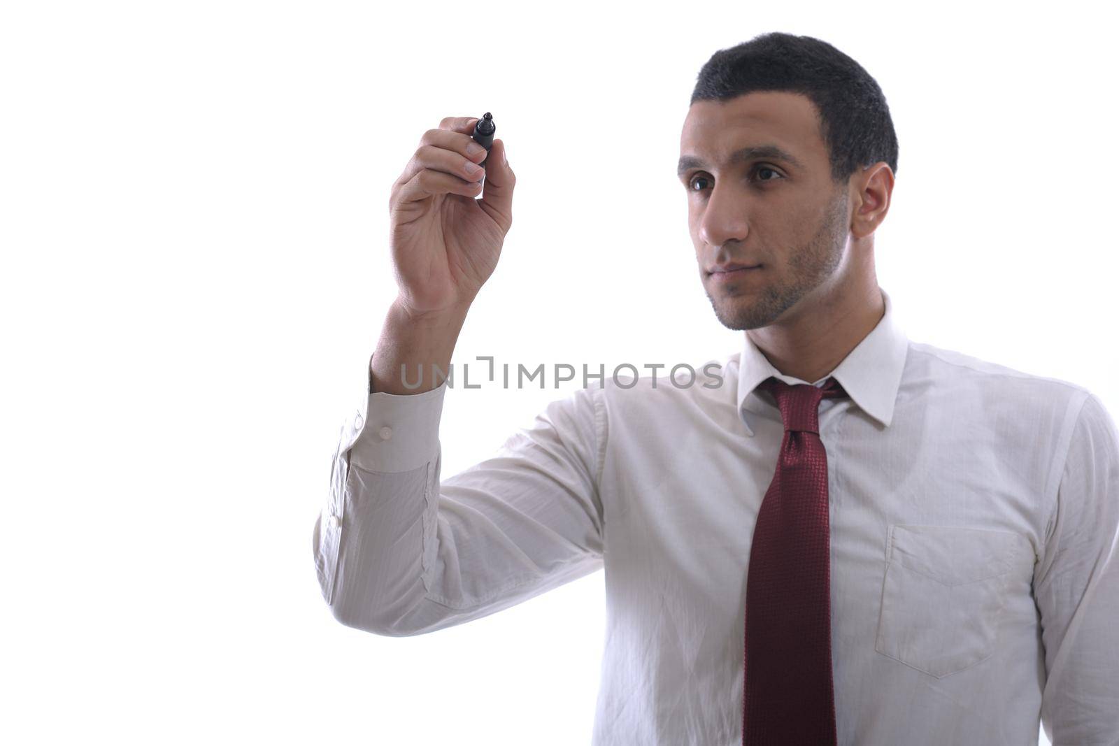 business man draw with marker on empty copy space isolated on white in studio