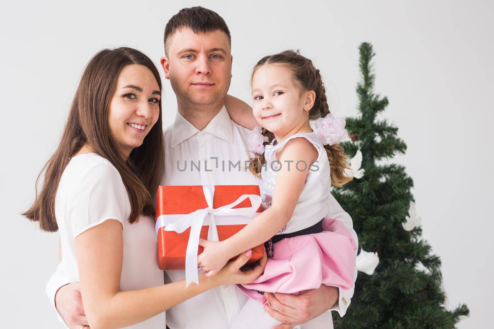 Children, festive and holidays concept - Christmas family portrait in home holiday living room by Satura86