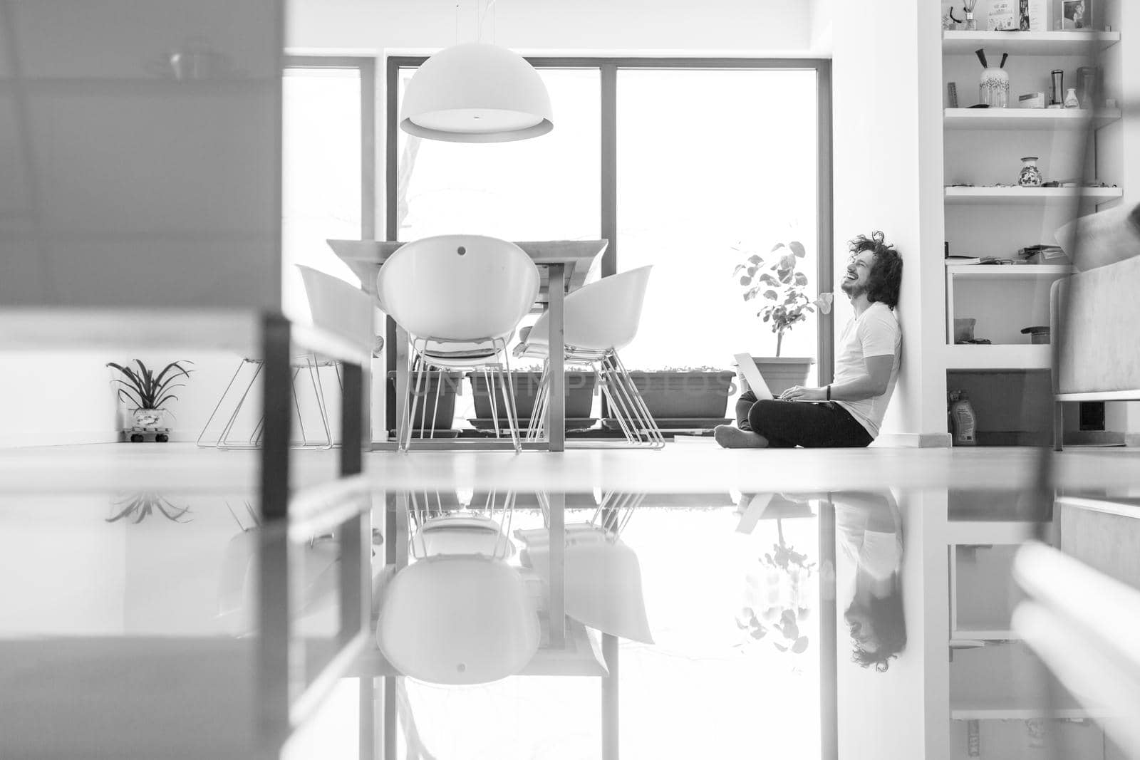 Real man Using laptop on the floor At Home  Enjoying Relaxing