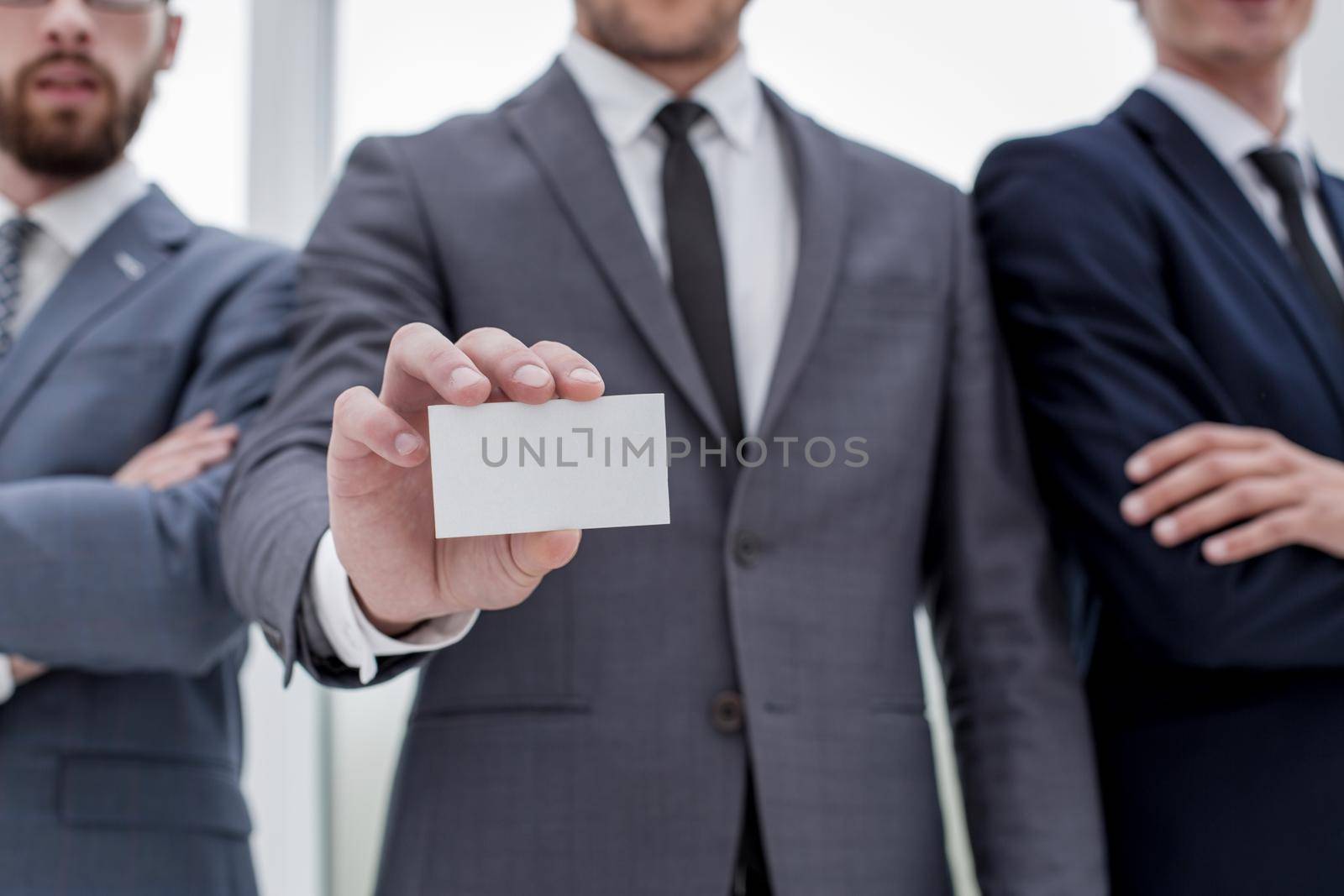 business team leader showing business card .business concept