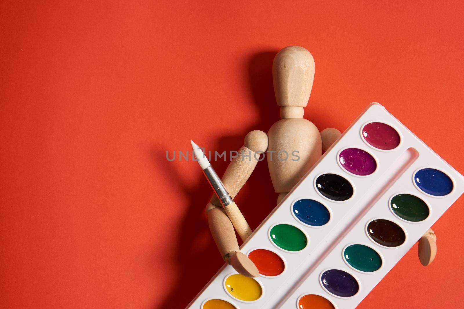 paints for artist drawing school learning art red background. High quality photo