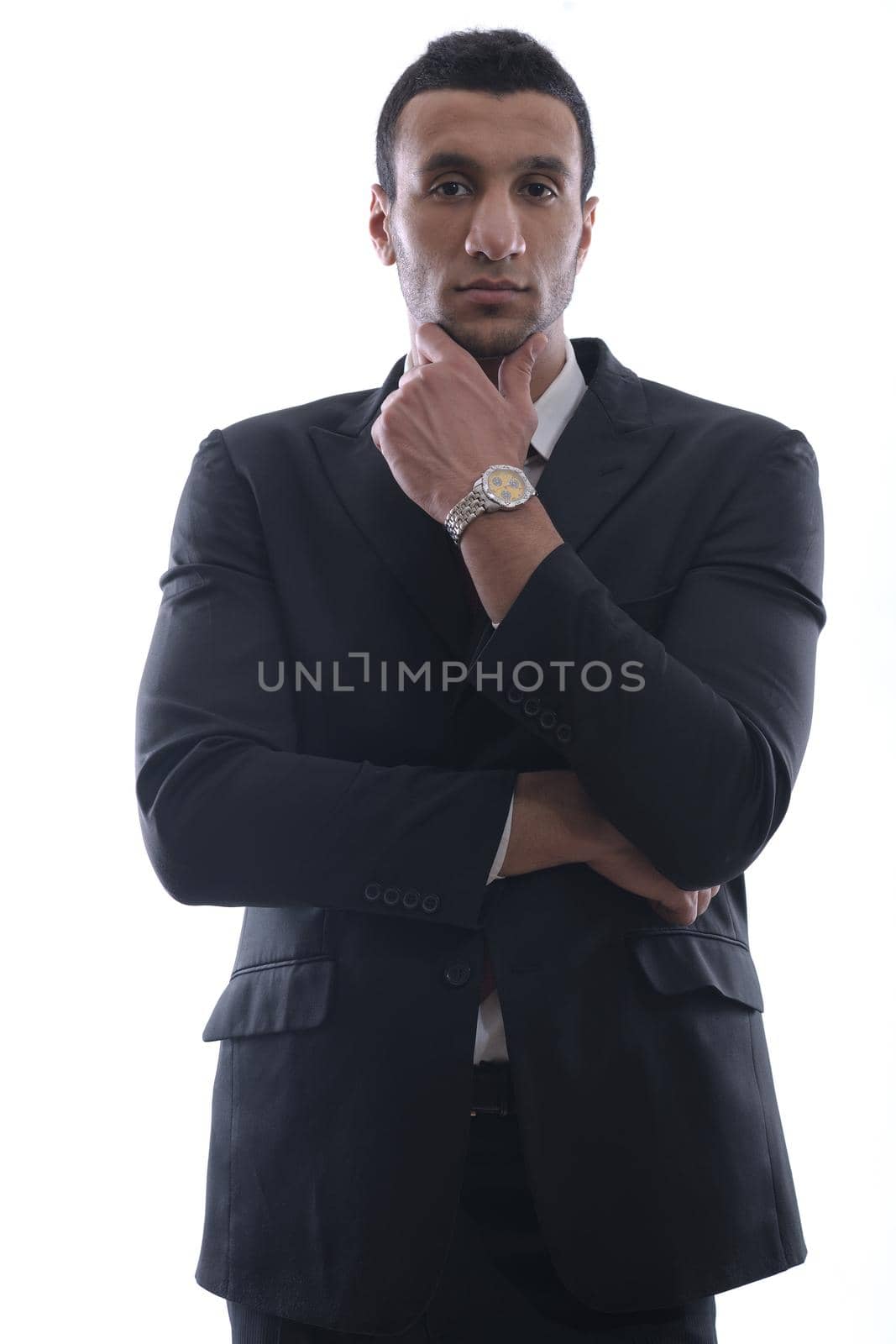 Portrait of happy smiling young arab business man isolated on white background