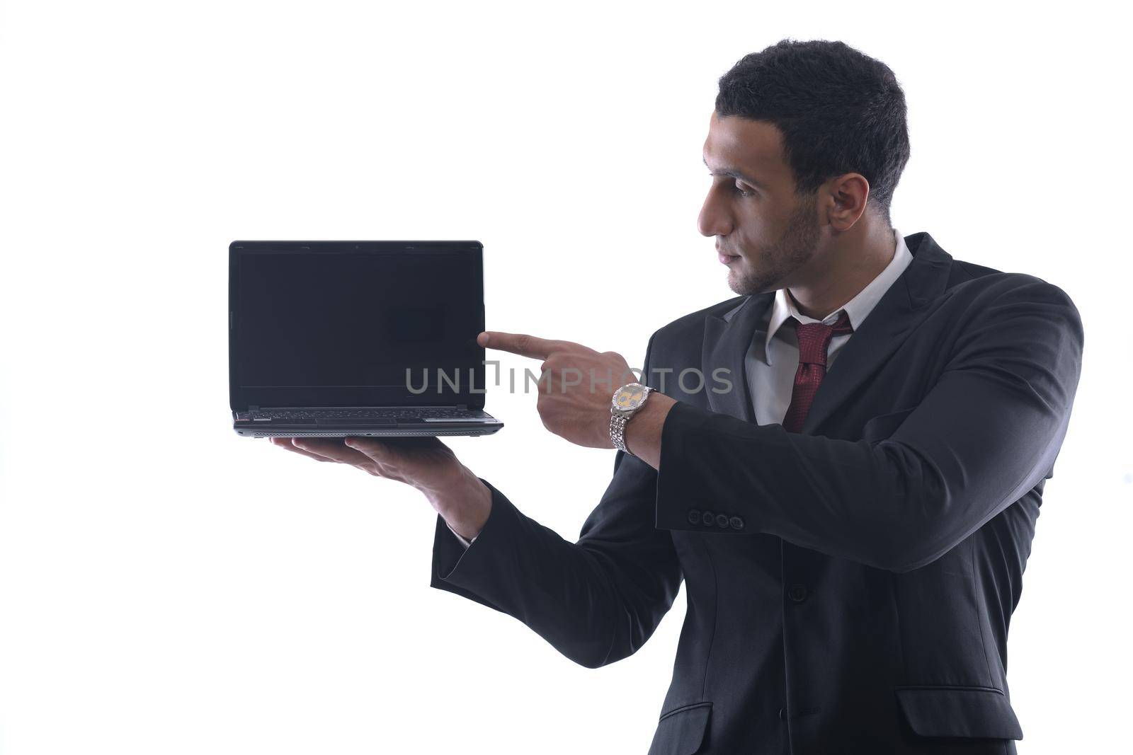 Smiling business man hold and work on mini laptop comuter   Isolated on white background in studio
