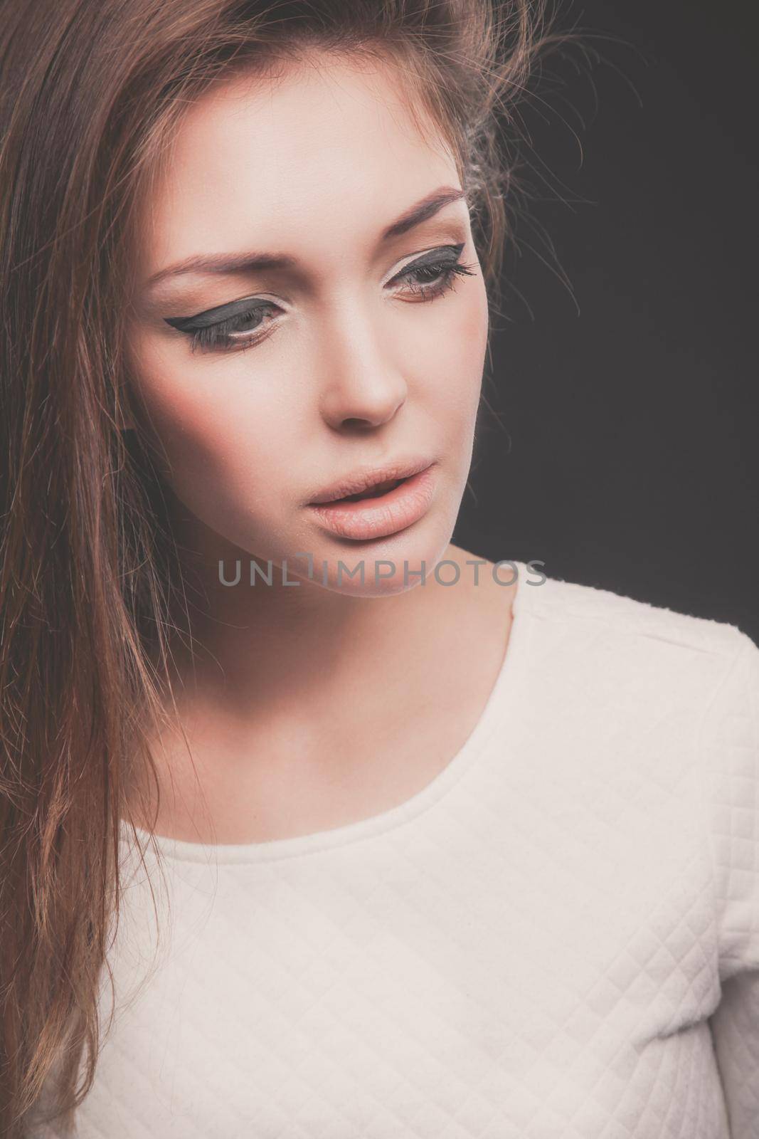 Portrait of a beautiful woman , isolated on black background. Portrait of a beautiful woman.