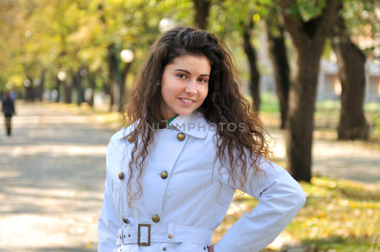 brunette Cute young woman smiling outdoors in nature