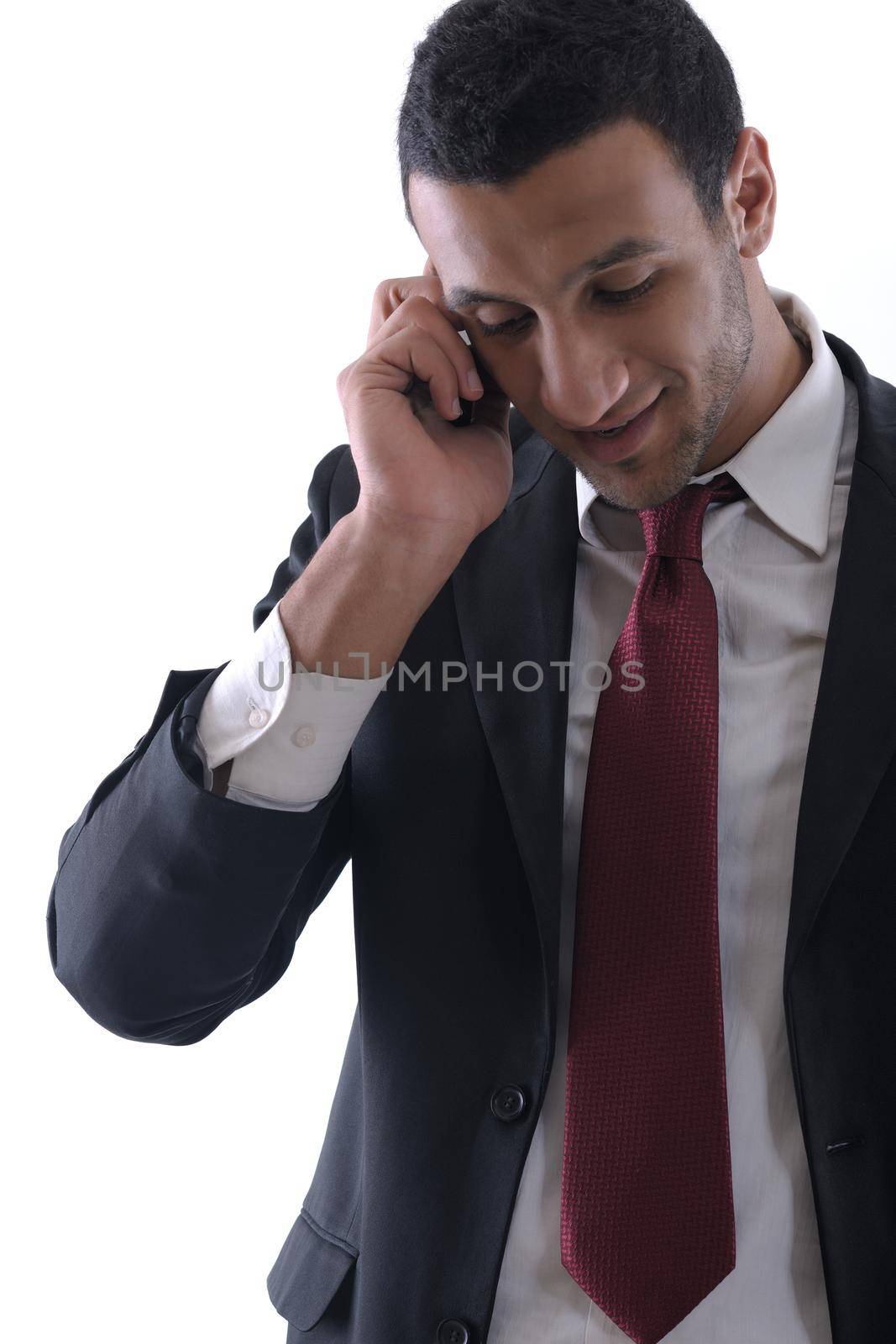 business man with  mobile phone by dotshock