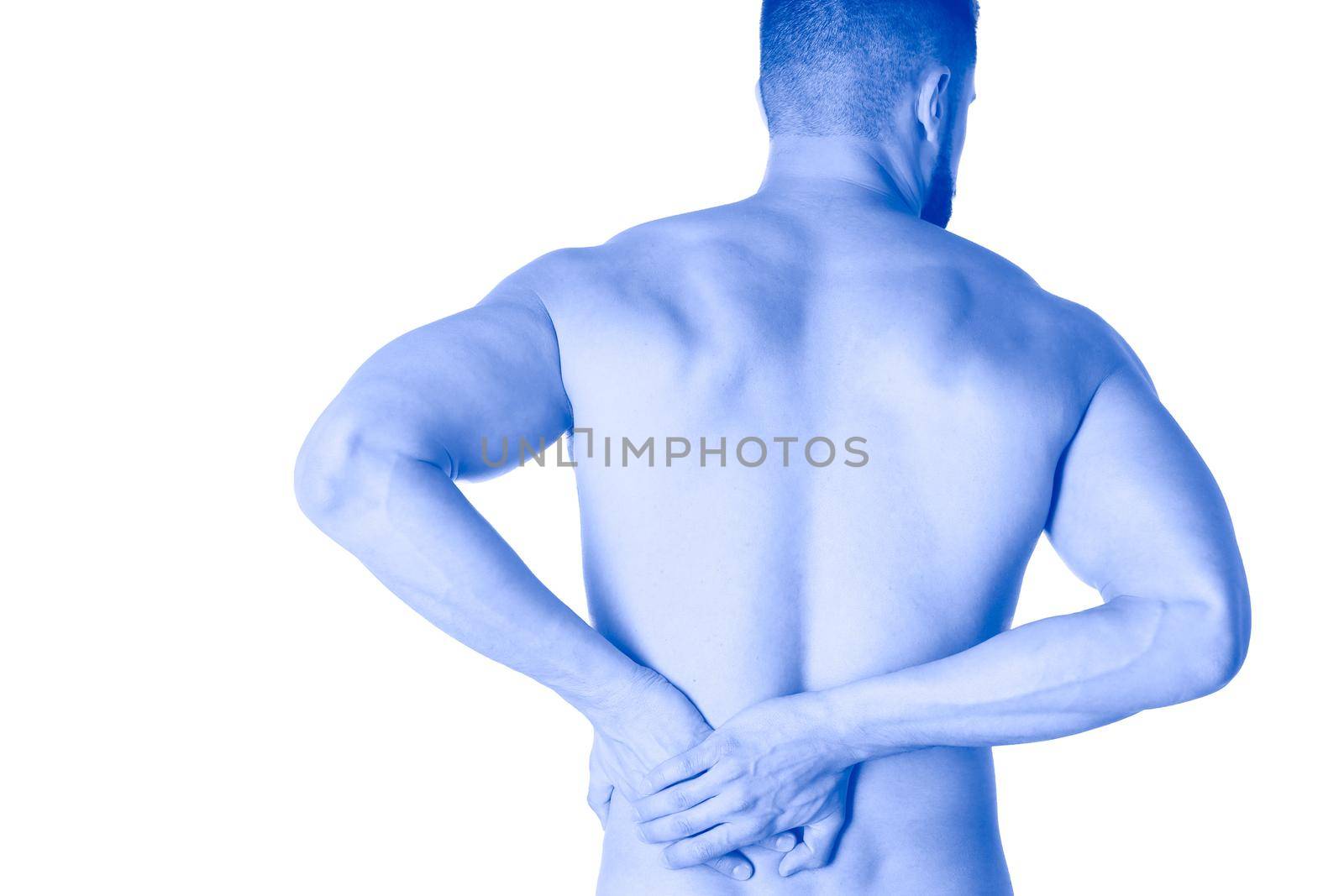 Young man holding his neck in pain. Medical concept.