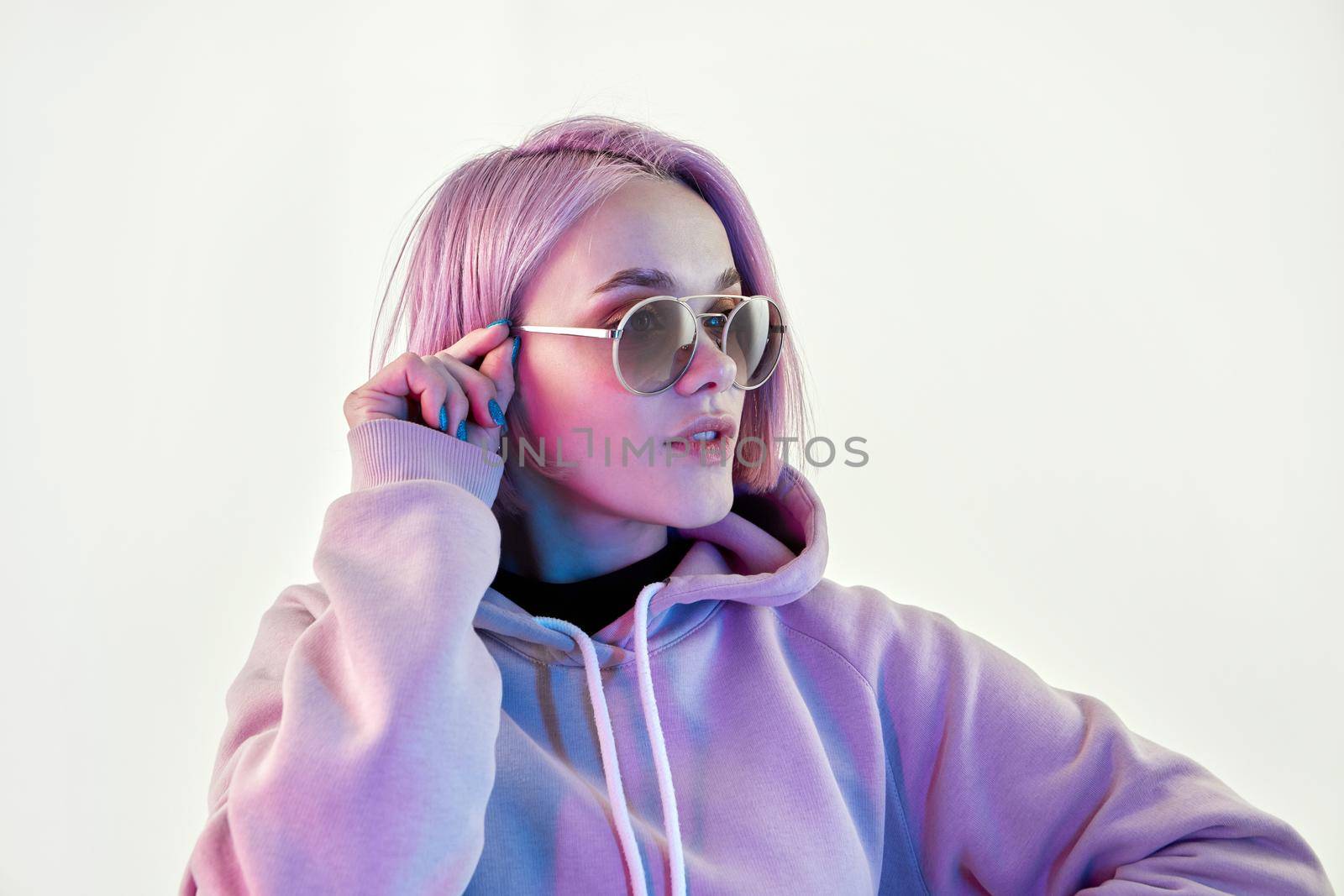 Woman with pink hair in sunglasses on white background by Demkat