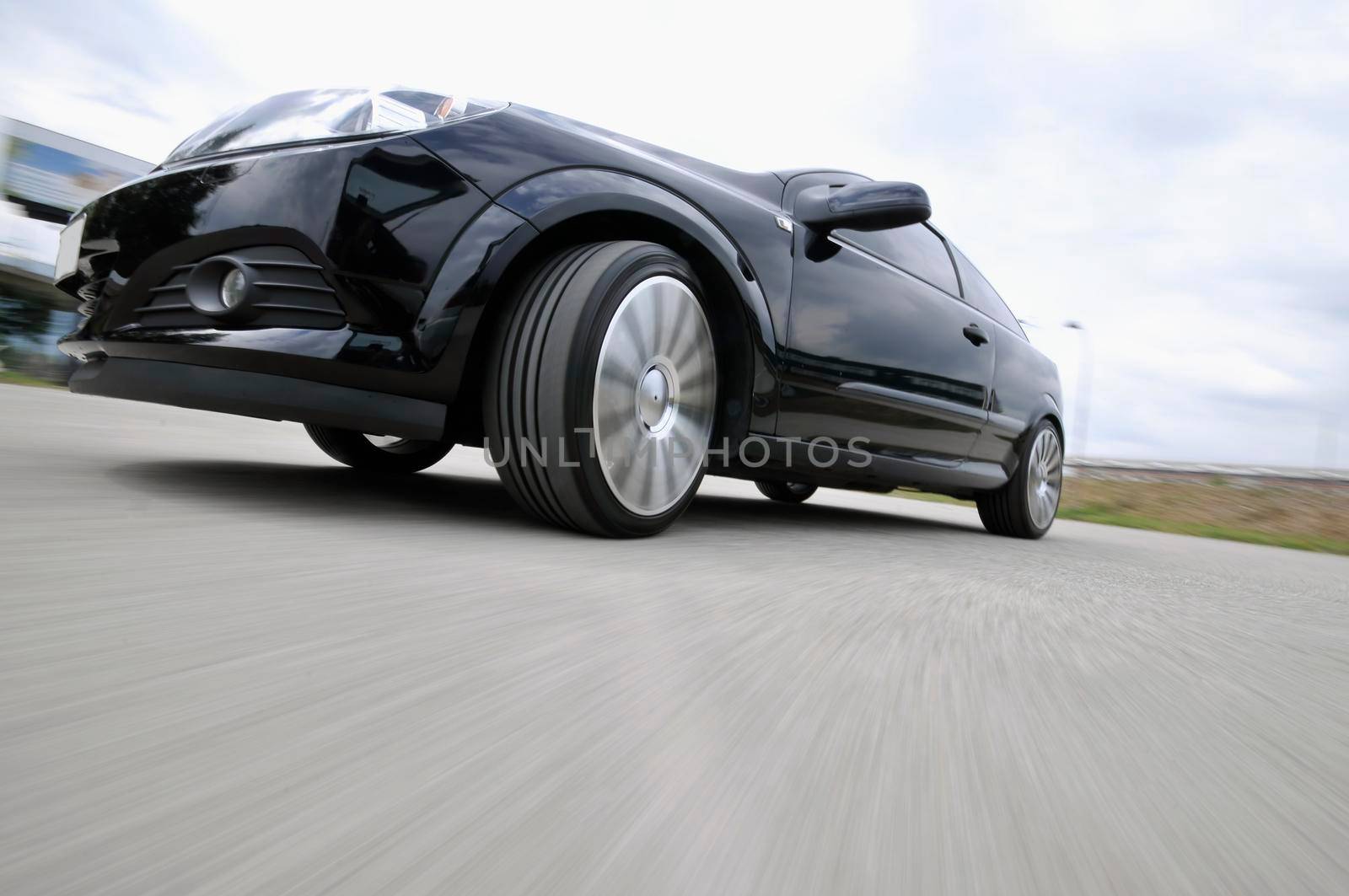 Fast car moving with motion blur by dotshock