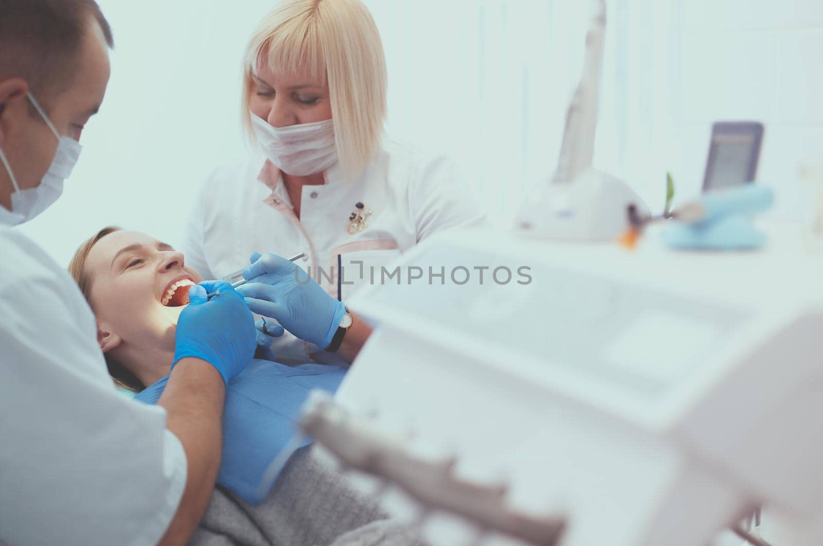Doctor and patient in the dental clinic by lenets