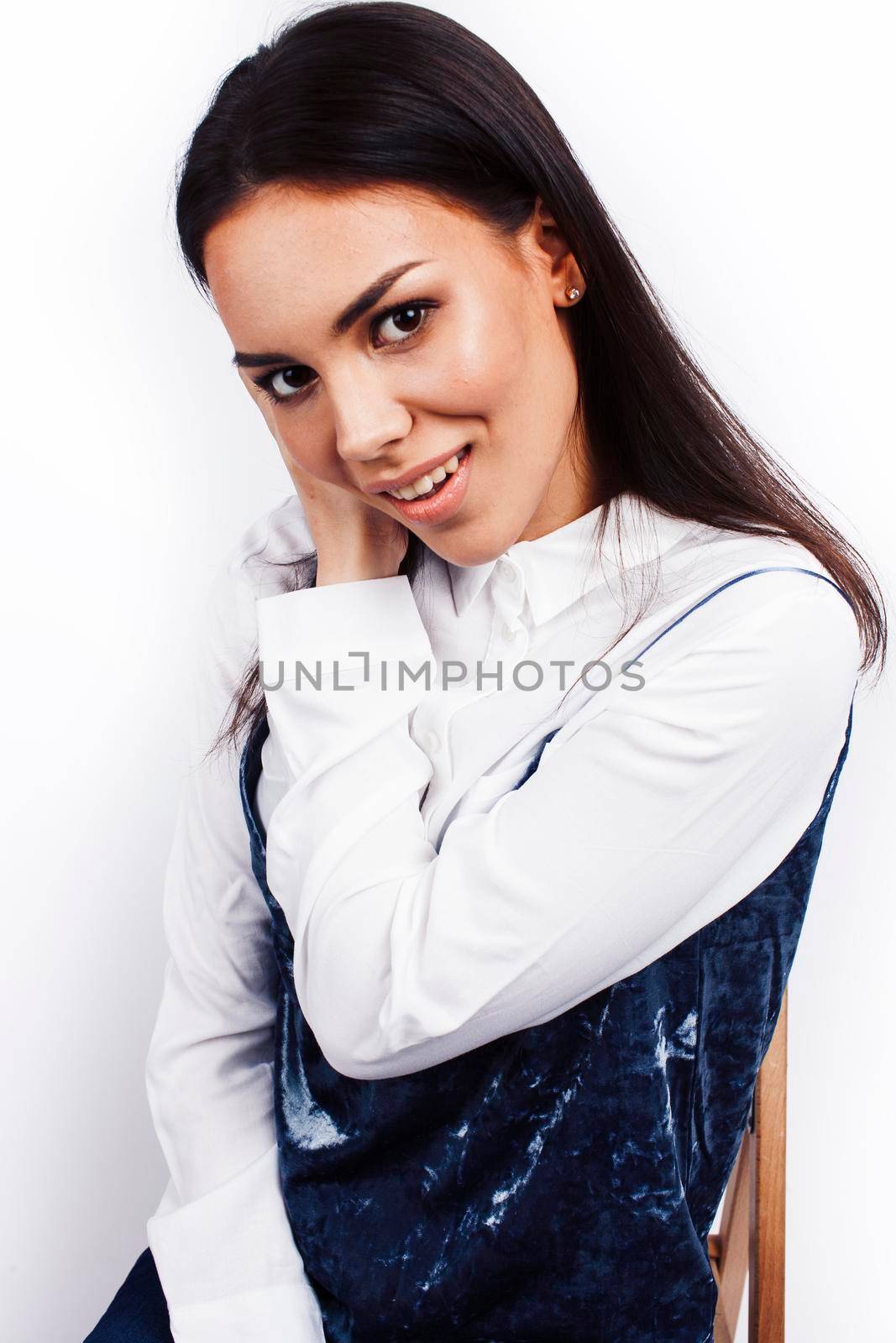 young happy smiling latin american teenage girl emotional posing isolated on white background, lifestyle people concept close up