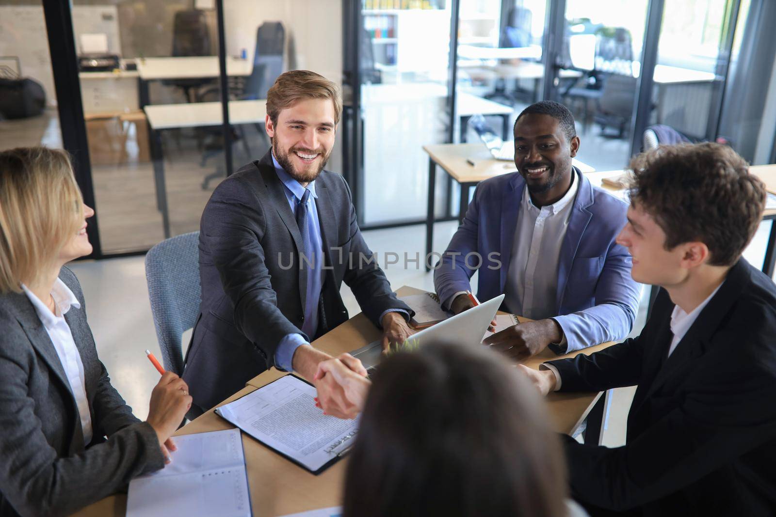 Job applicant having interview. Handshake while job interviewing