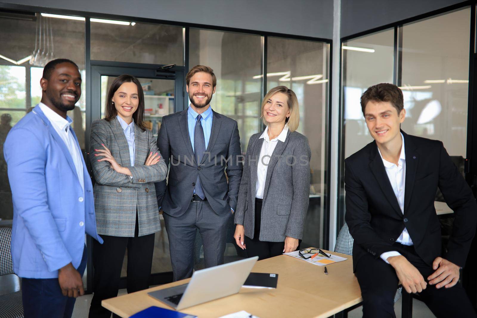 Group of successful business people on the background of the office