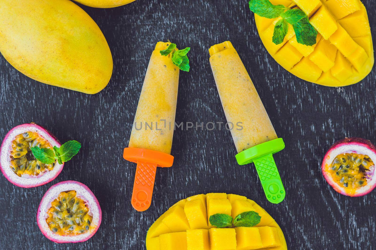 Homemade ice cream from mango and passion fruit Popsicle.