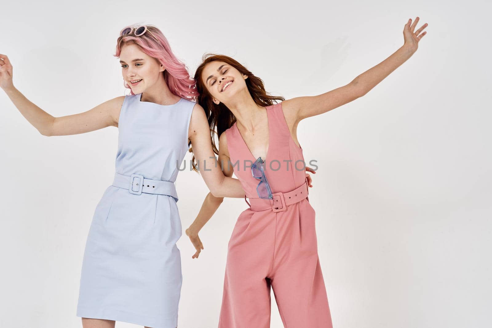 two fashionable girlfriends posing stylish clothes luxury models by Vichizh