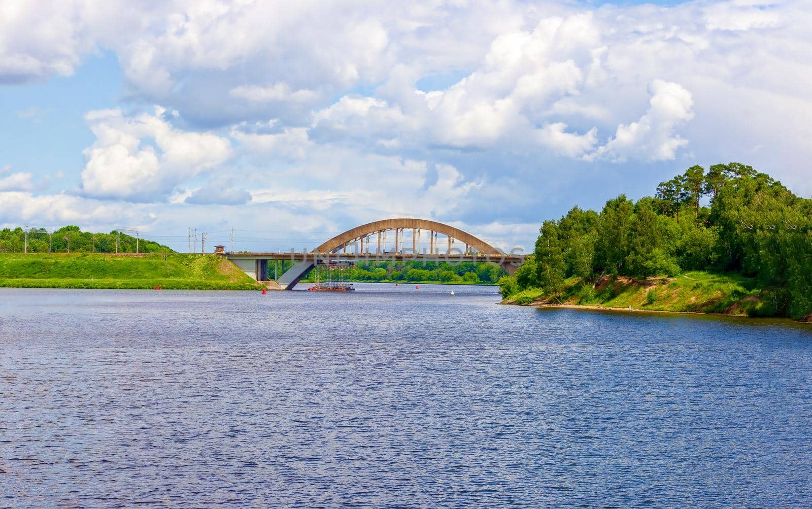 Channel named after Moscow, to a view of the beautiful bridge from the ship during a river cruise. Russia, Moscow region. The concept of family tourism.