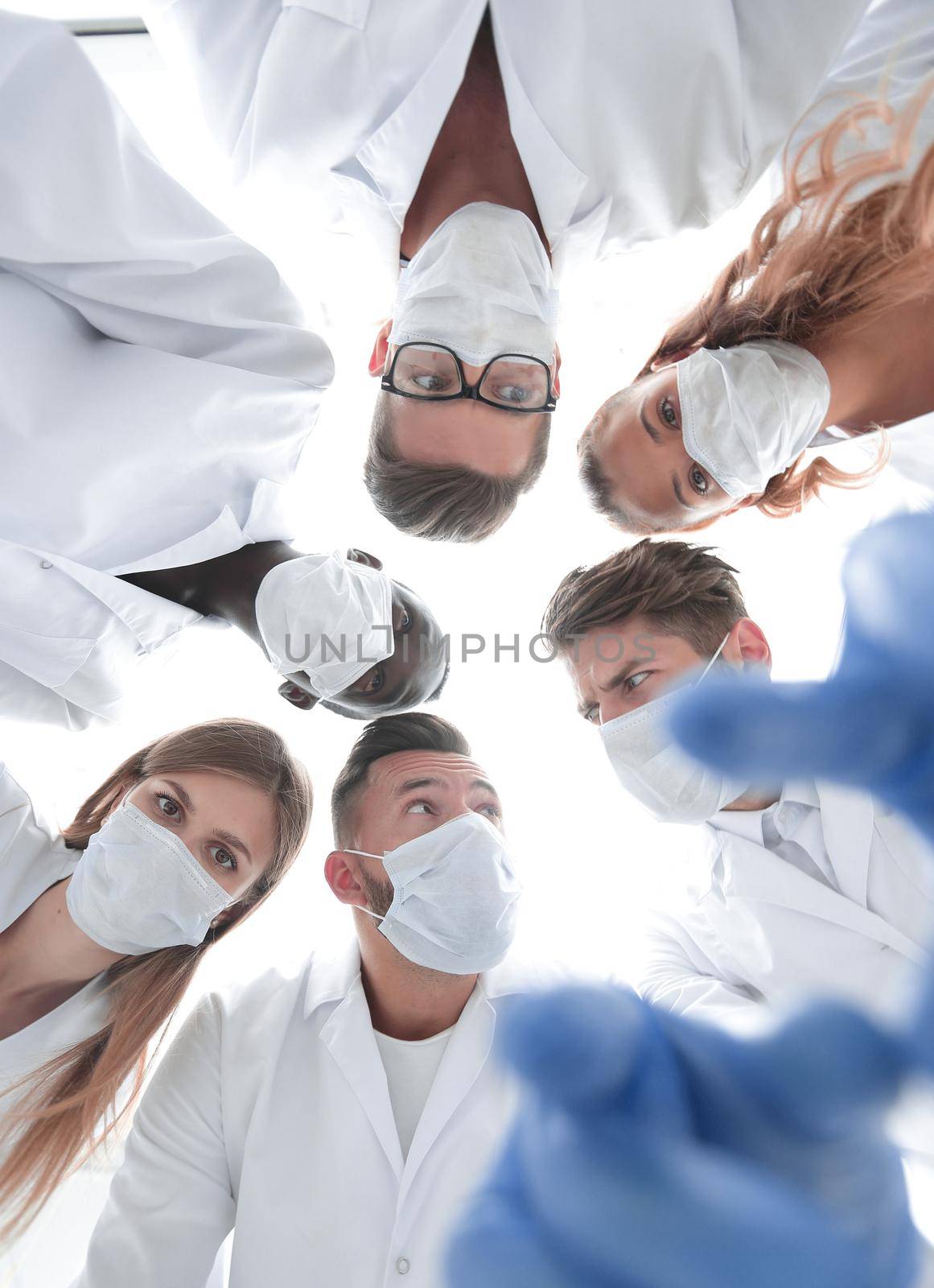 Surgical team working on a bleeding patient in a surgical room