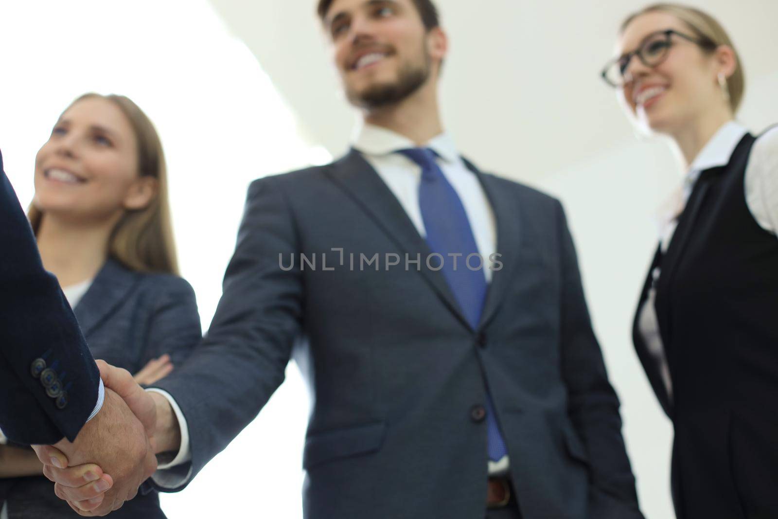 Business people shaking hands, finishing up a meeting