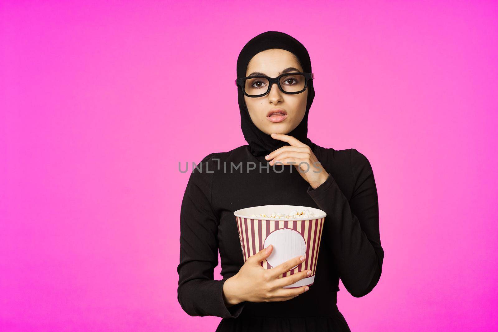 cheerful woman fun popcorn entertainment fashion model ethnicity. High quality photo