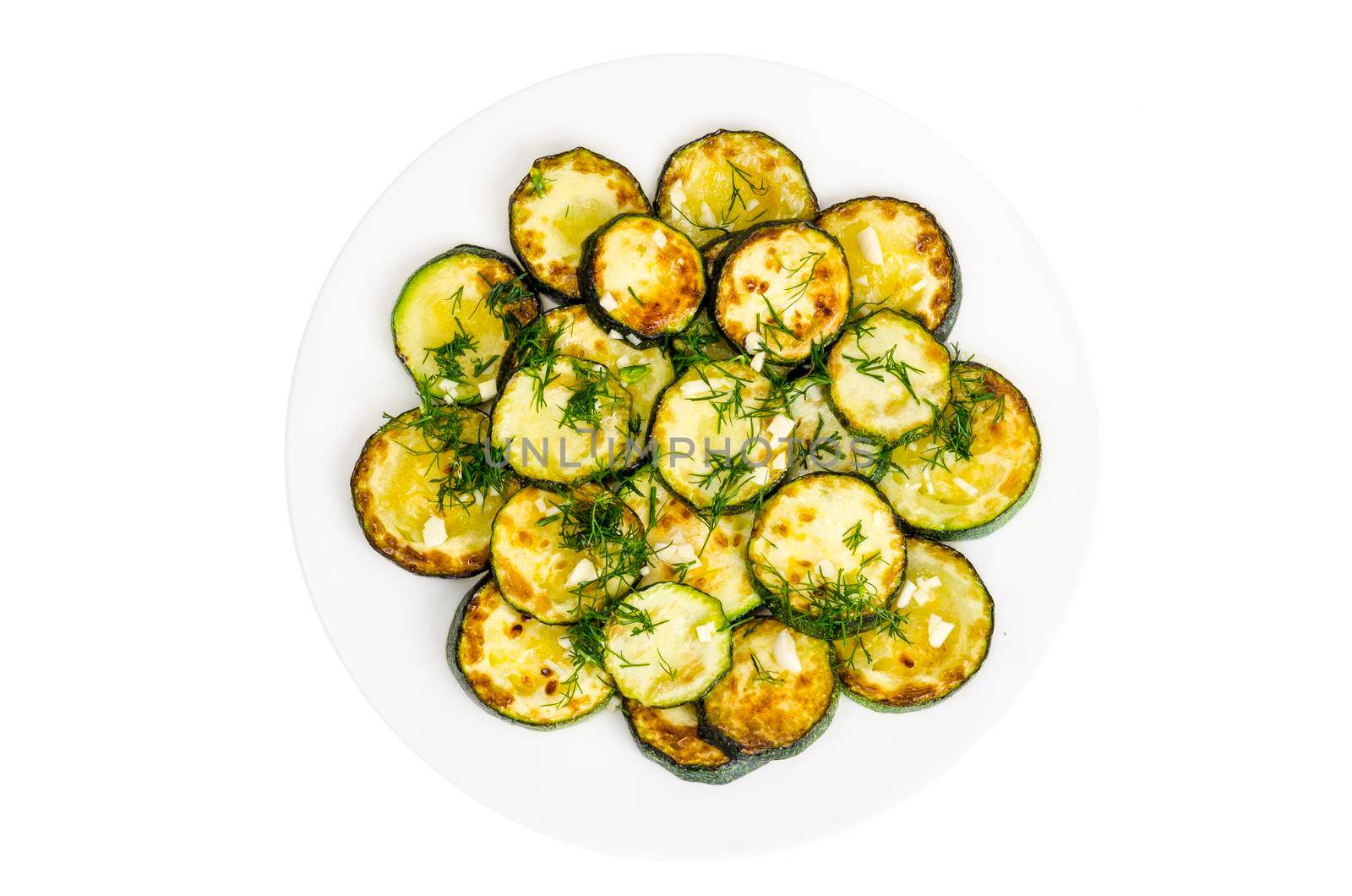 Grilled zucchini with garlic and herbs. Studio Photo