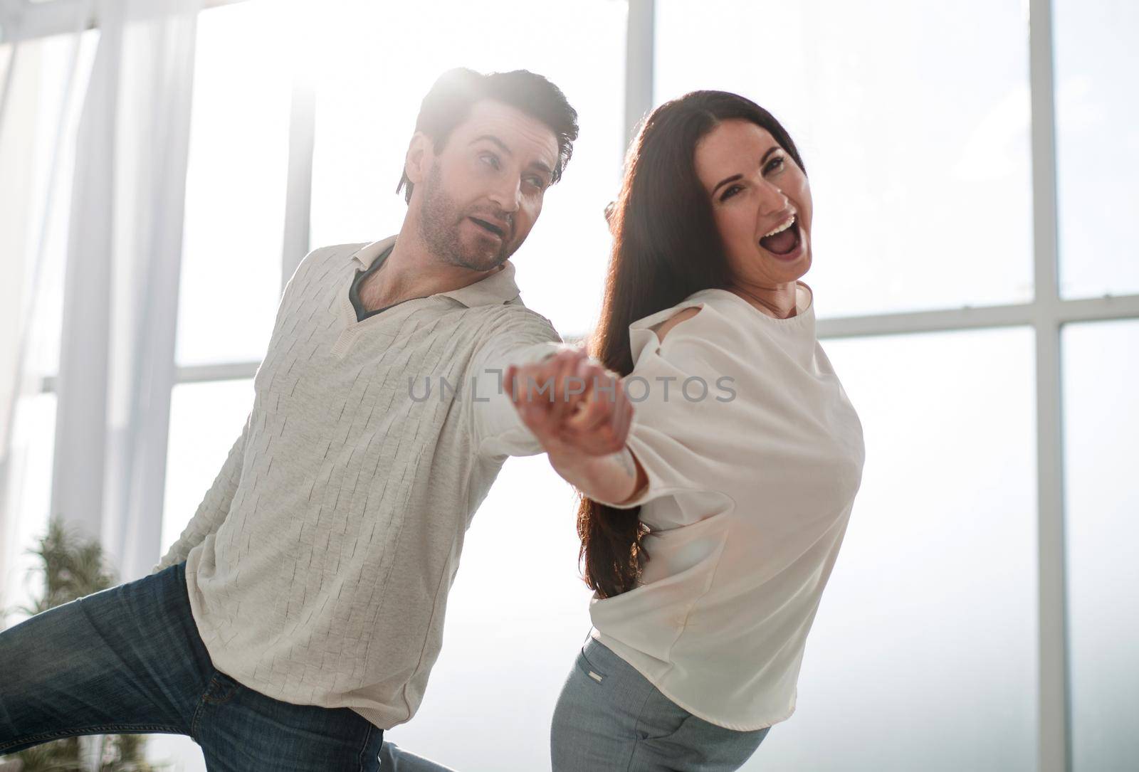 loving couple hugging each other in new apartment .photo with copy space