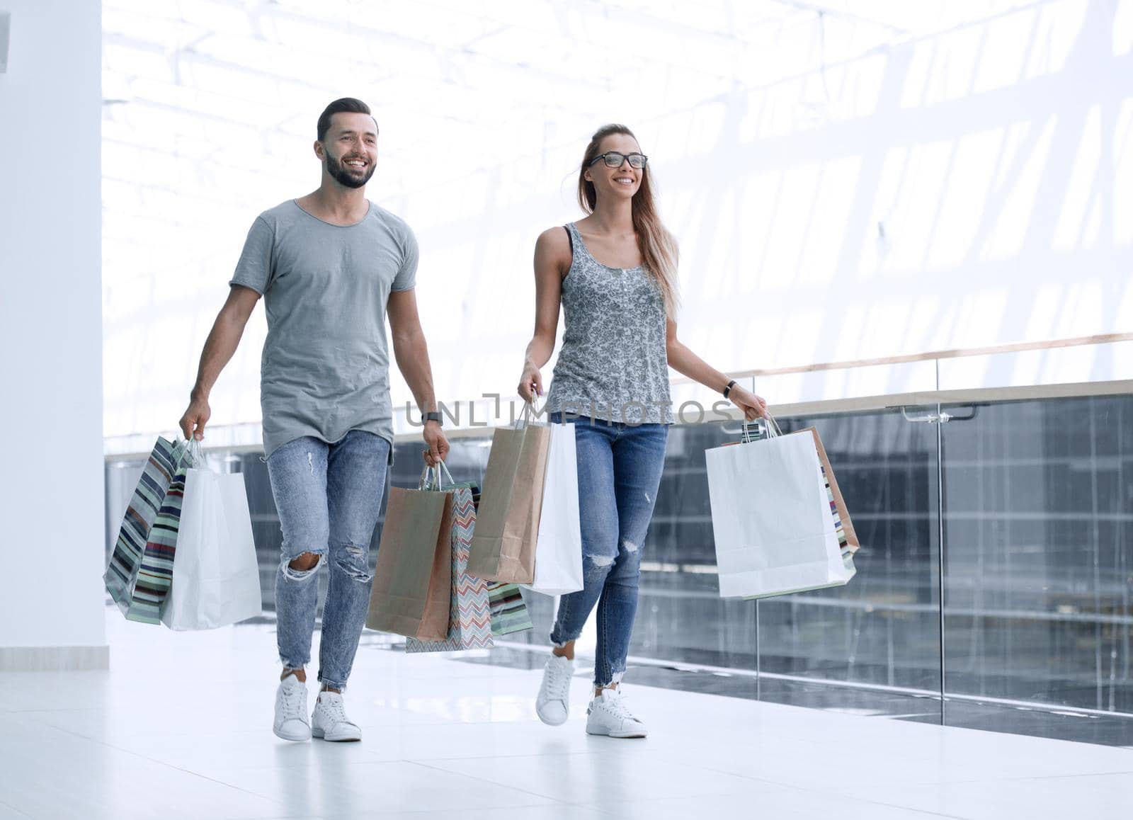 modern couple with shopping bags.photo with copy space