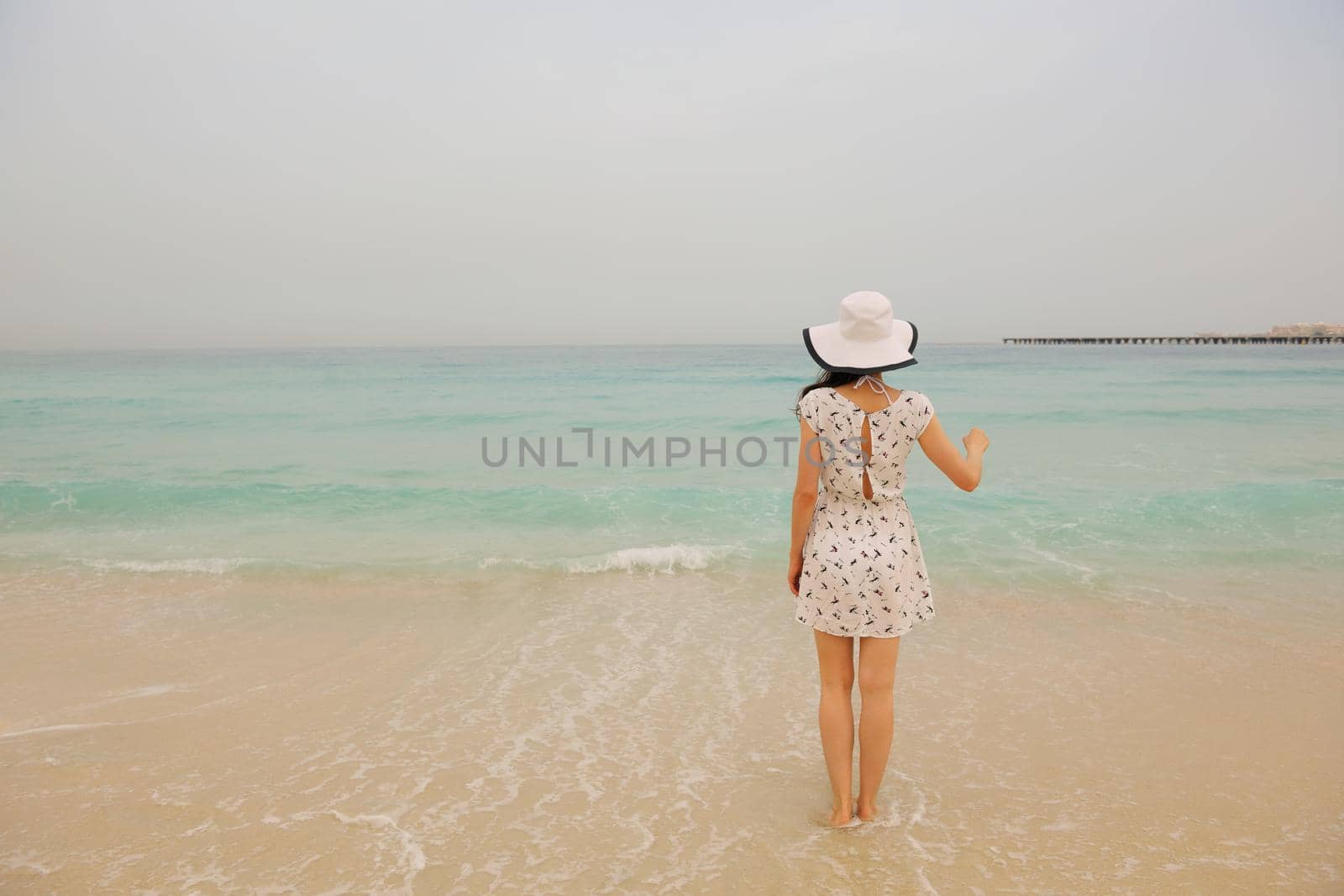 Happy Beautiful Woman Enjoying Summer Vacation on beach