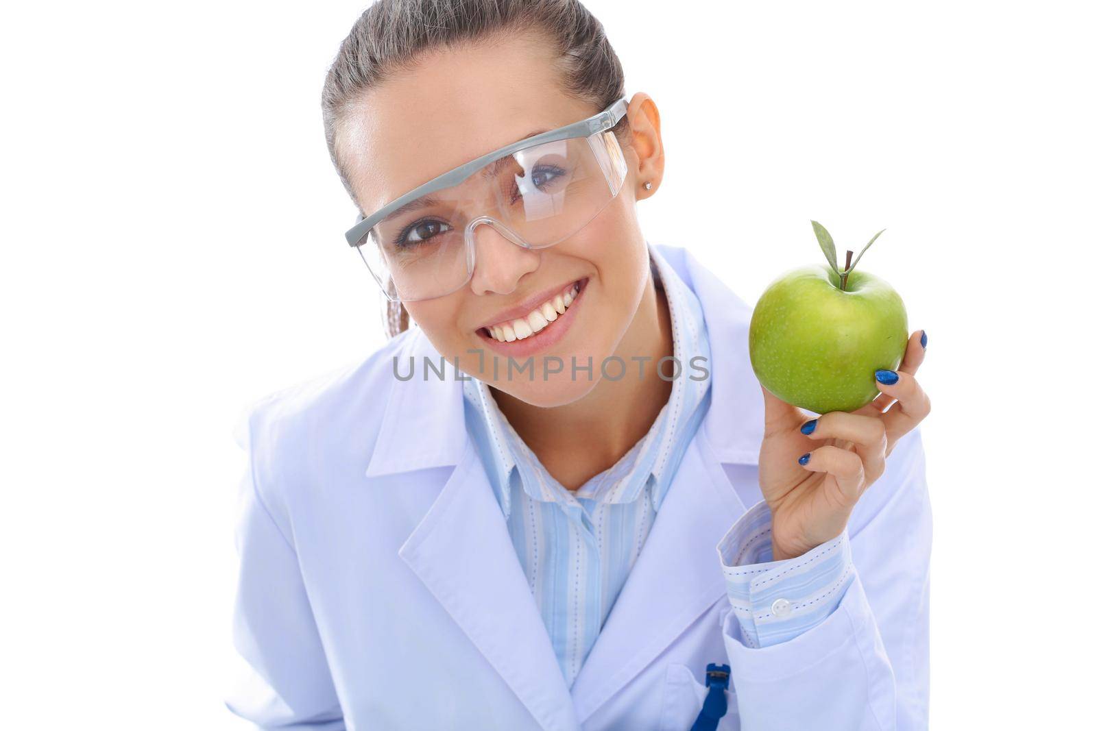 Dentist medical doctor woman hold green fresh apple in hand and tooth brush. Dentist doctors. Woman doctors.