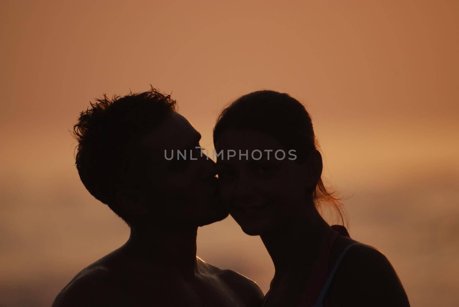 romantic couple on beach by dotshock