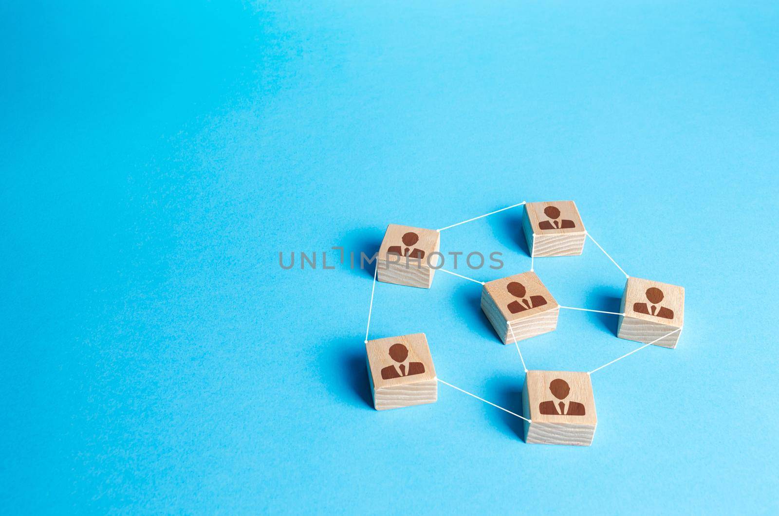 Figures blocks of people connected by lines on a blue background. Communication and interaction, building business relationships. Team building, distribution of responsibilities. Employee network by iLixe48