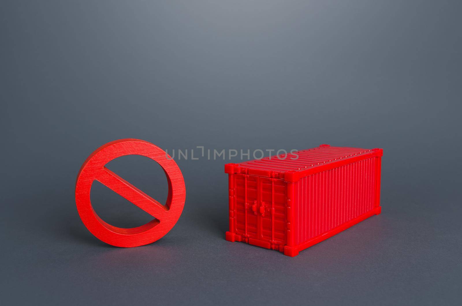 Red container and NO prohibition sign. Logistic crisis in cargo transportation by sea. Shipping container shortage concept. Imbalance in global trade. Impossibility of exporting goods from Asia.
