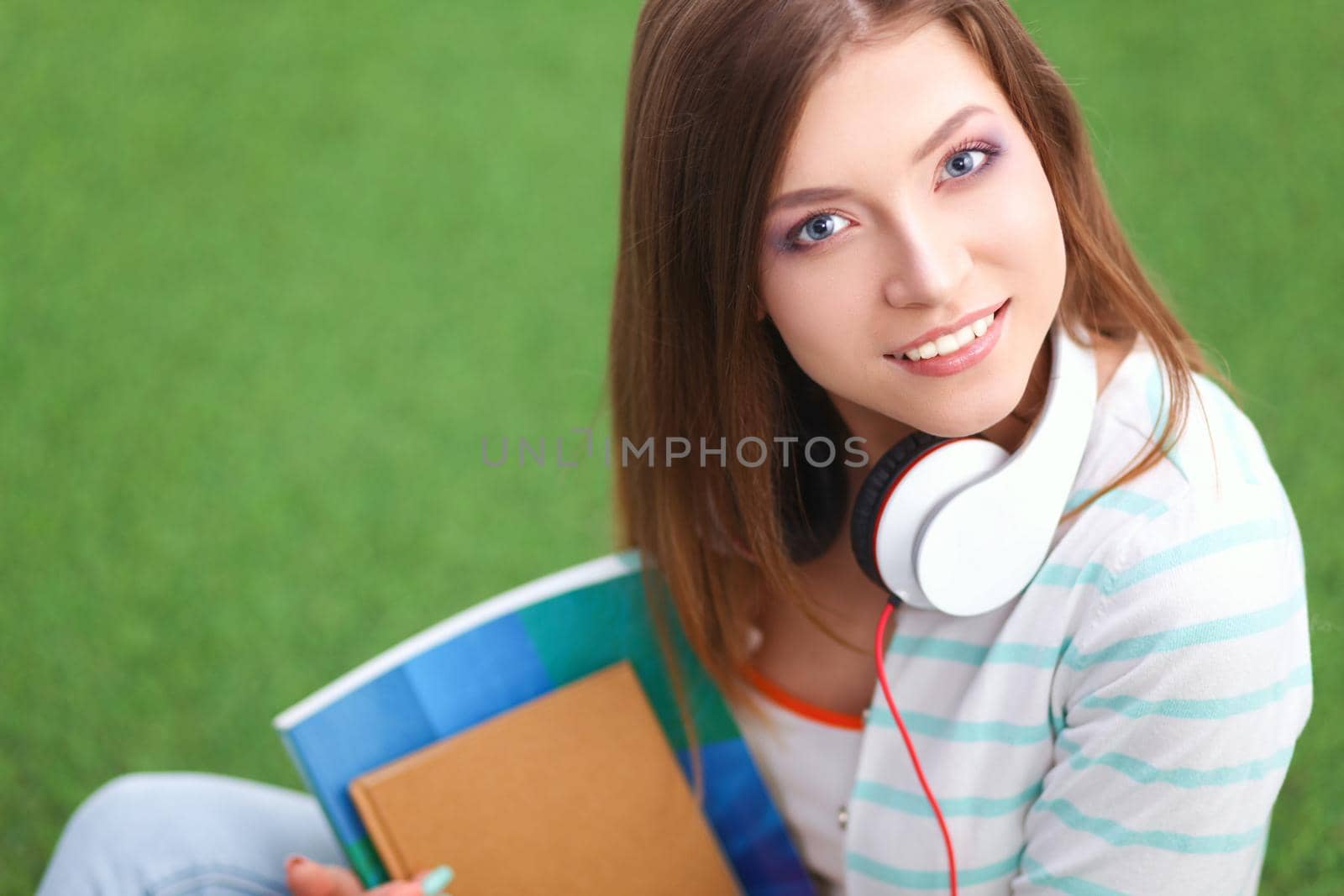 Young woman listening to the music .