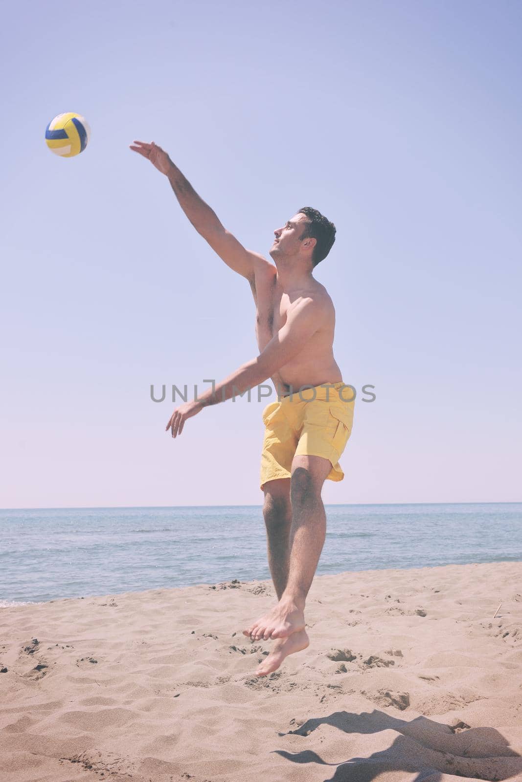 male beach volleyball game player by dotshock