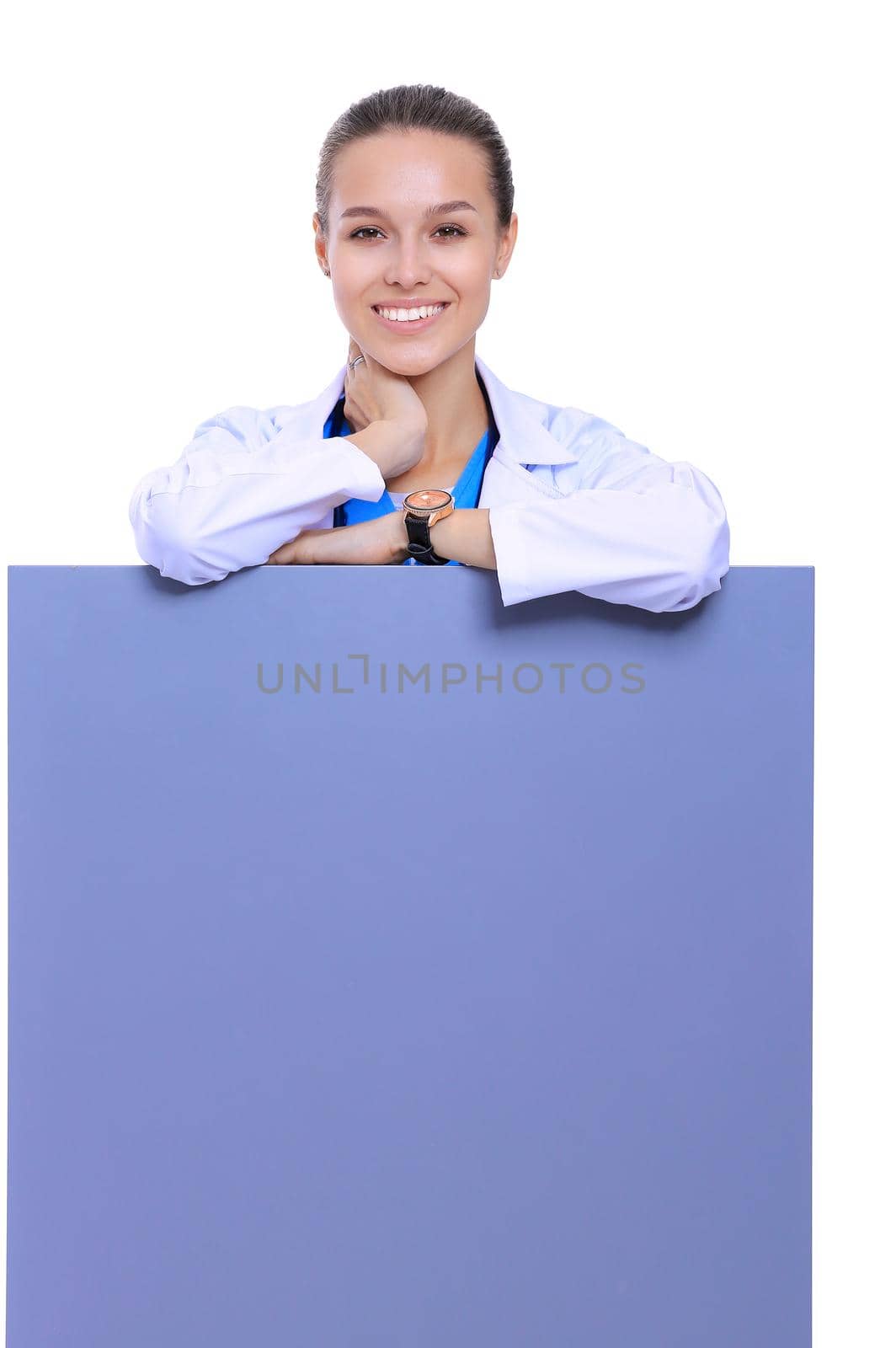 A female doctor with a blank billboard. Woman doctor.