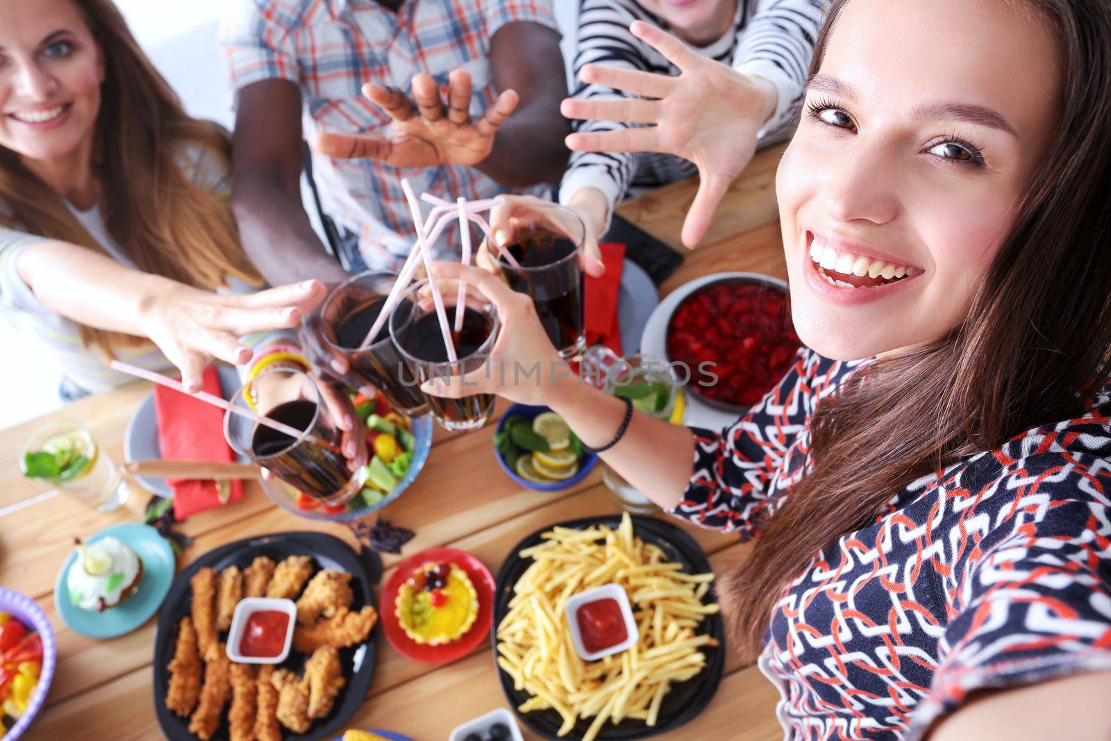 Group of people doing selfie during lunch. Self. Friends. Friends are photographed for eating by lenetstan