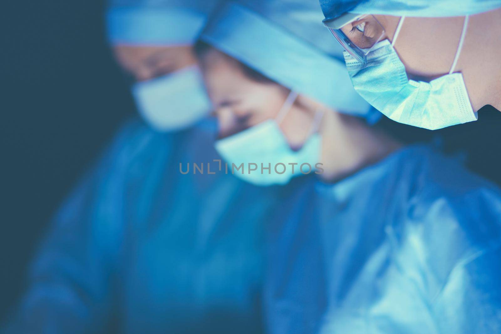 Team surgeon at work in operating room by lenetstan
