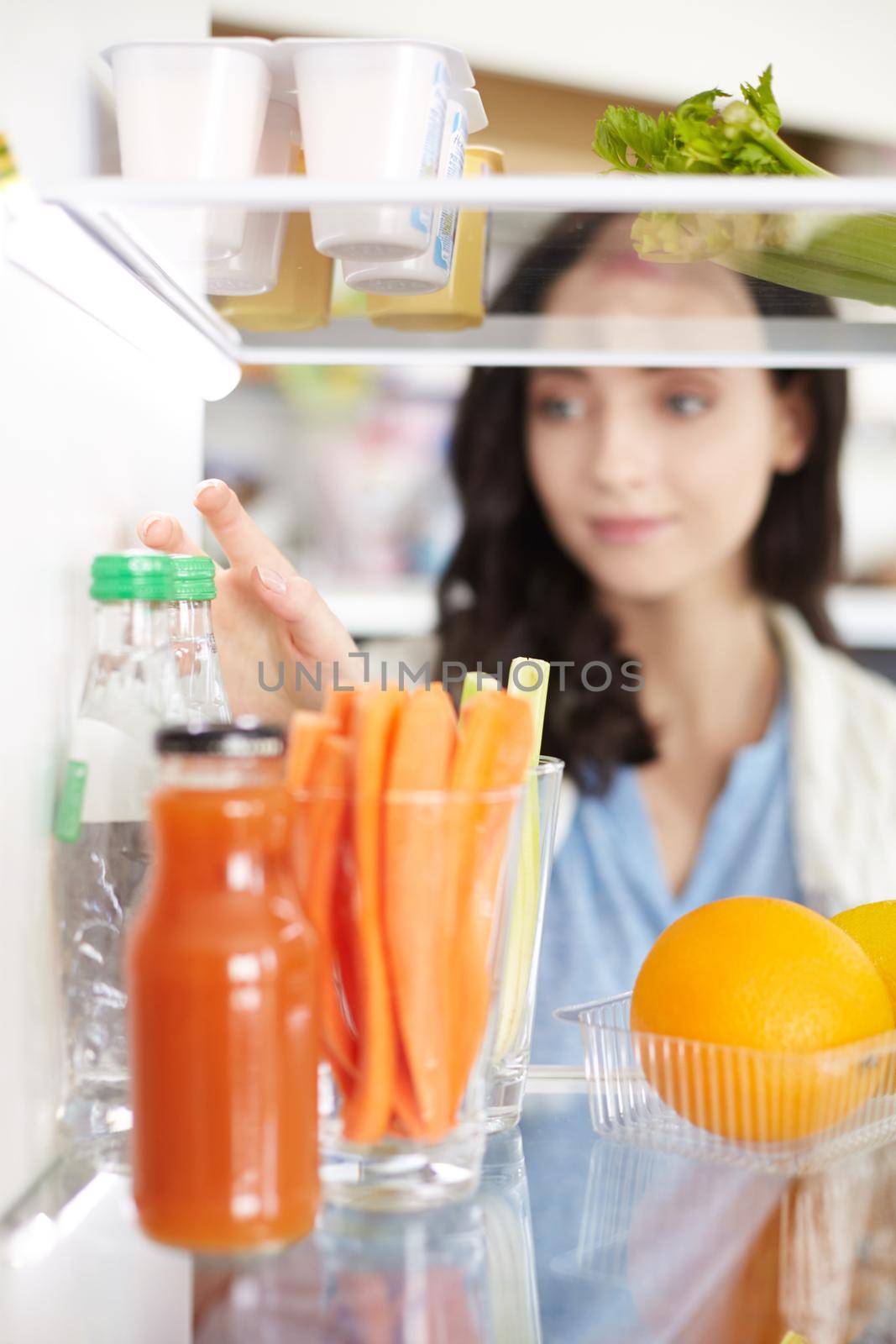 Open refrigerator with fresh fruits and vegetable. Open refrigerator.