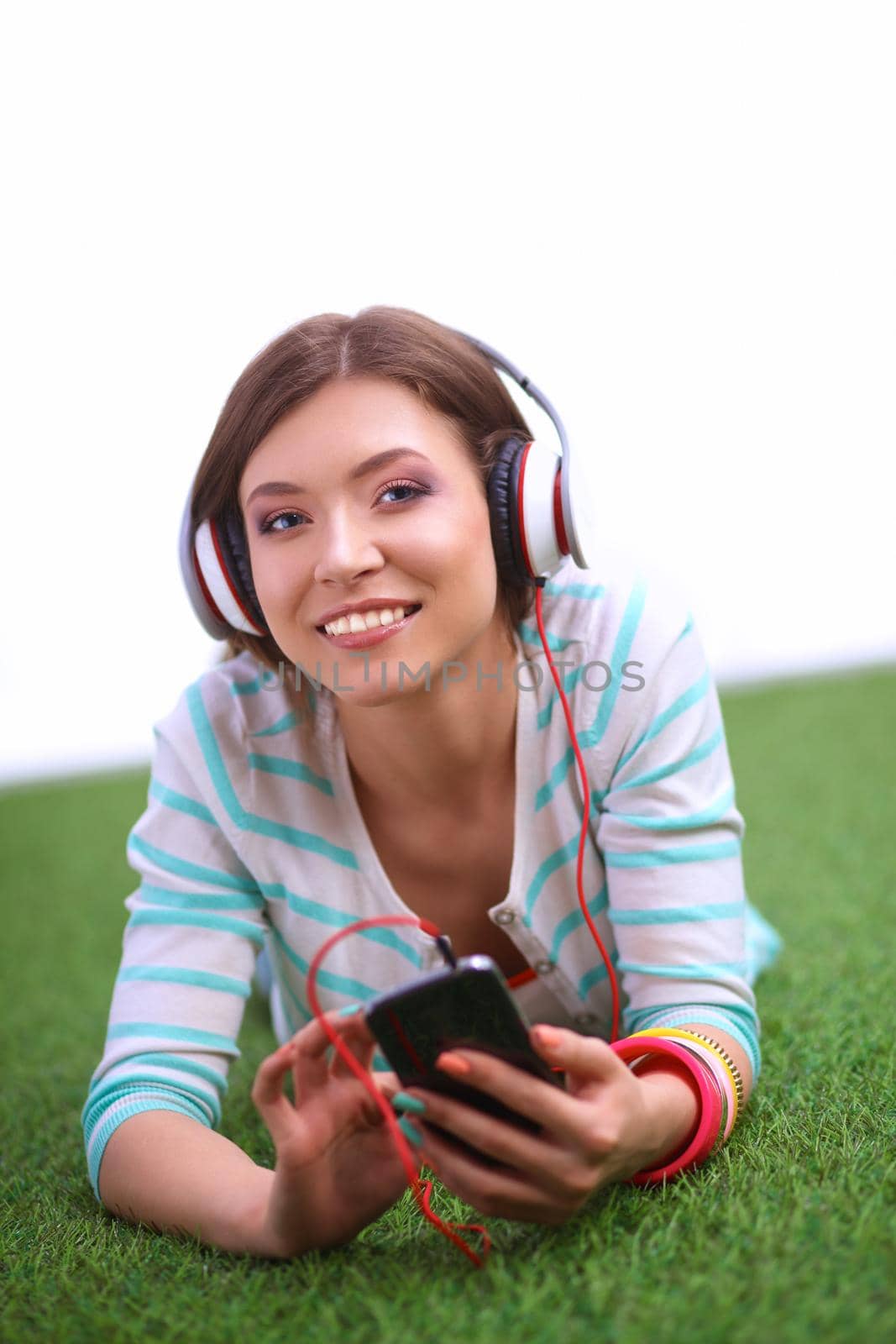 Young woman listening to the music .