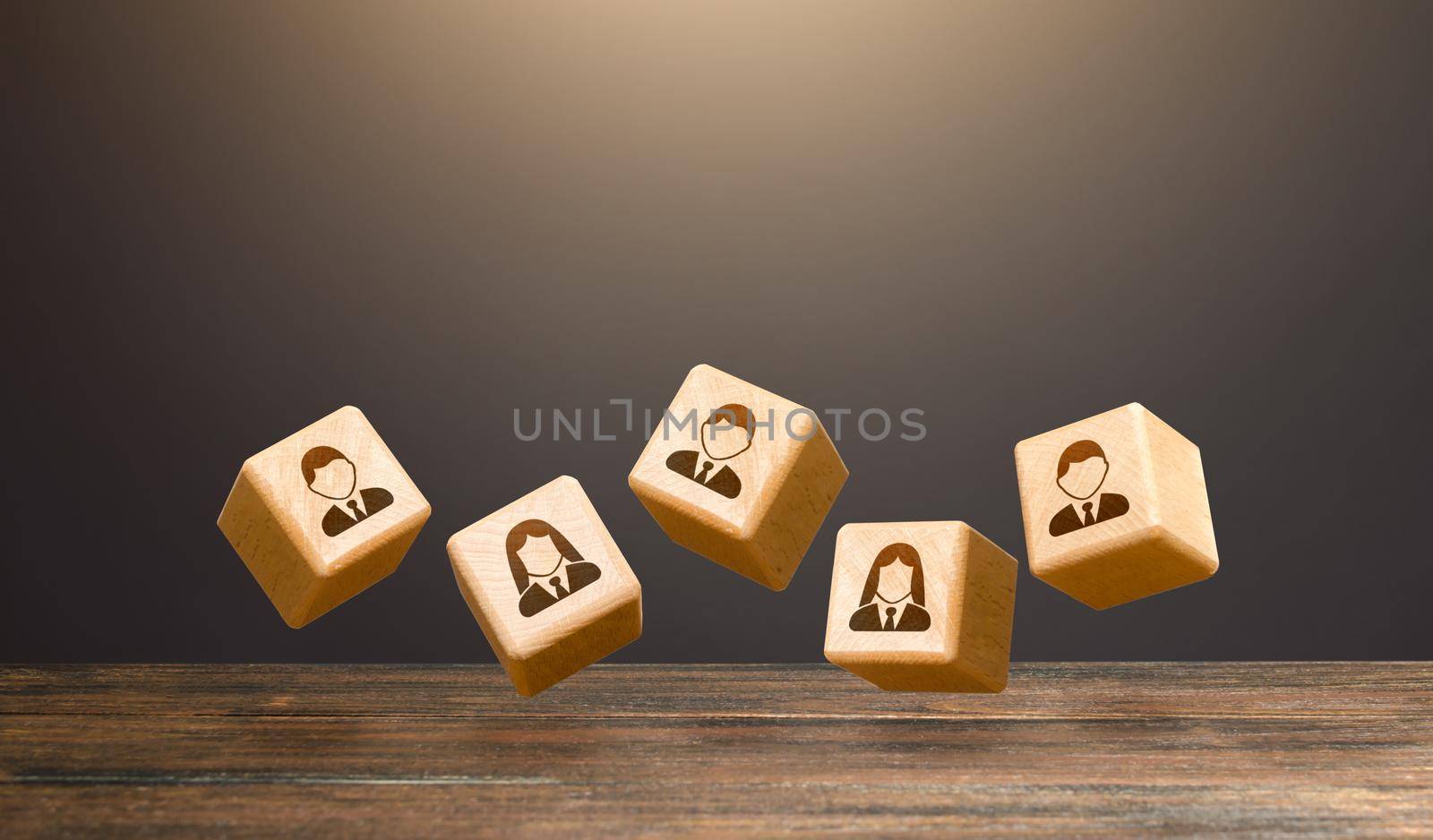 Levitating blocks with employees on a dark background. Human resources. Team creation for a new project. Leadership. Hiring and recruiting staff workers. Formation of effective working group. by iLixe48