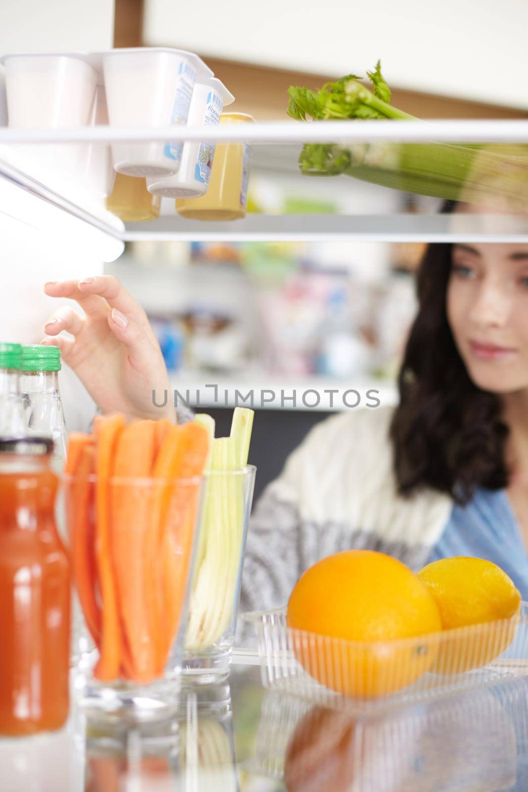 Open refrigerator with fresh fruits and vegetable. Open refrigerator.